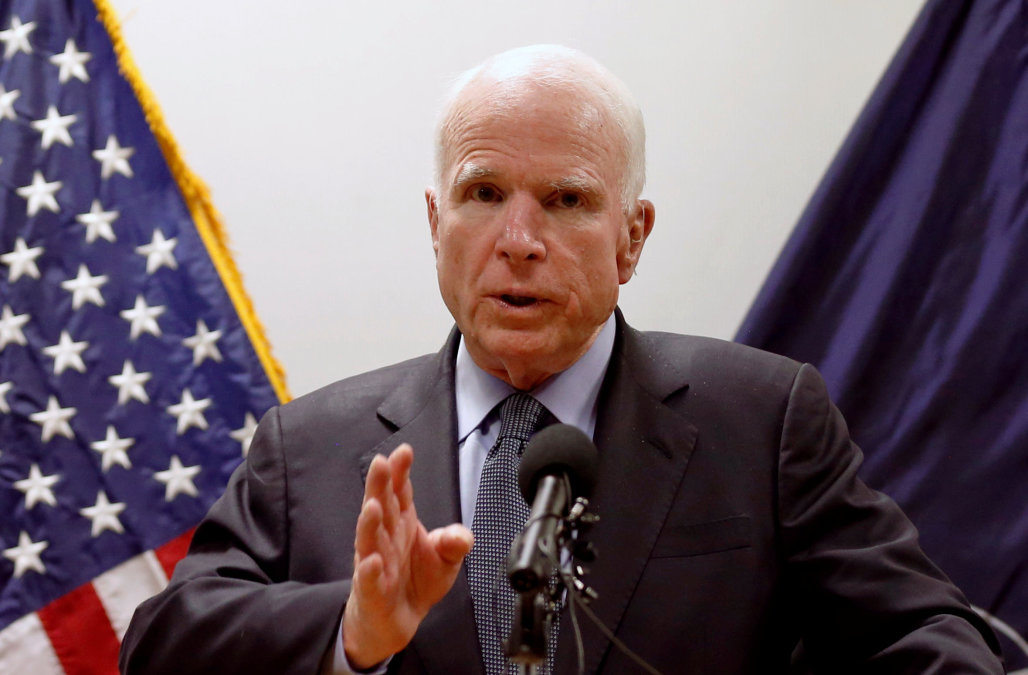 U.S. Senator John McCain speaks during a news conference in Kabul